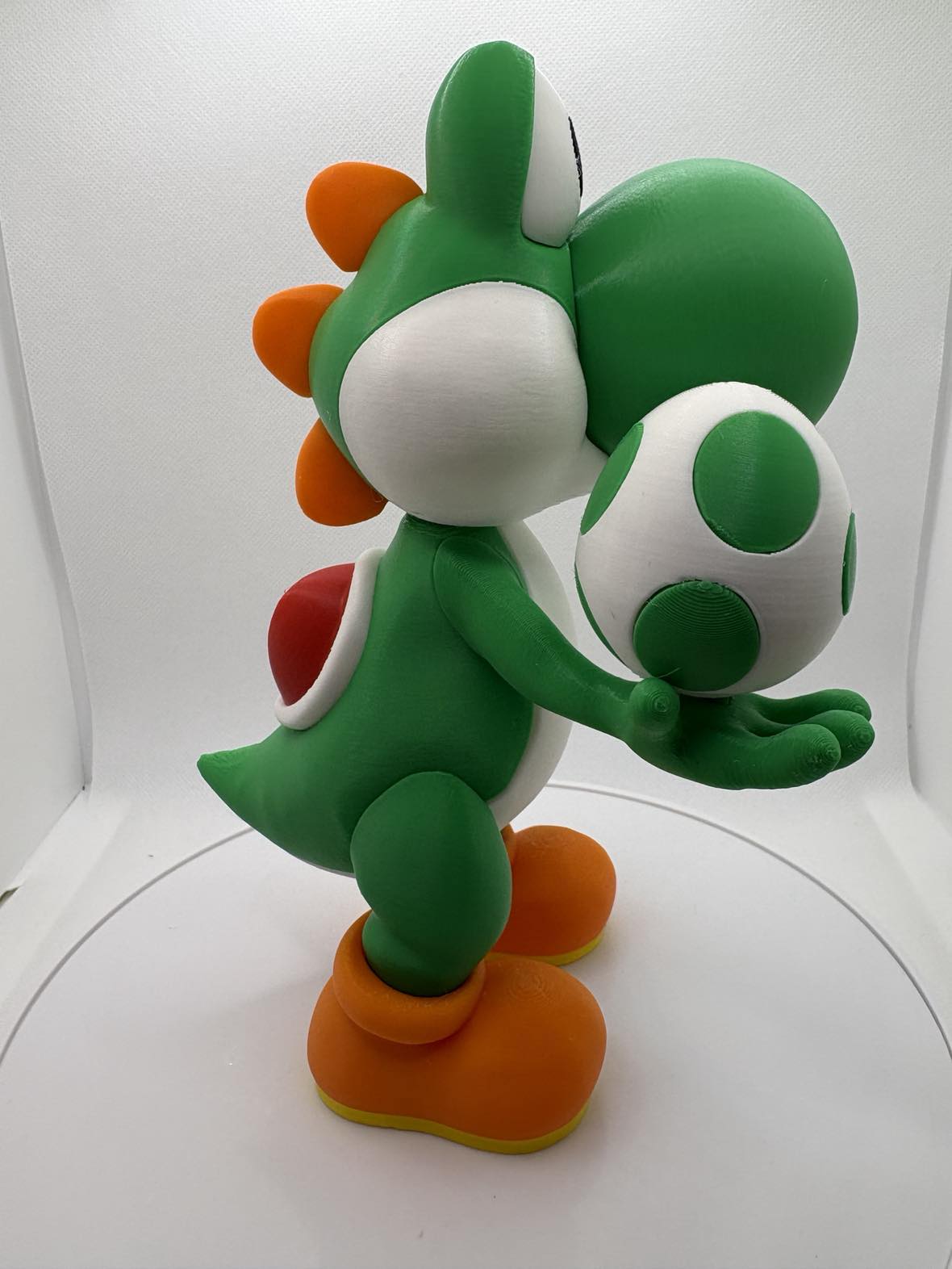 Super Mario Character - Yoshi holding an egg